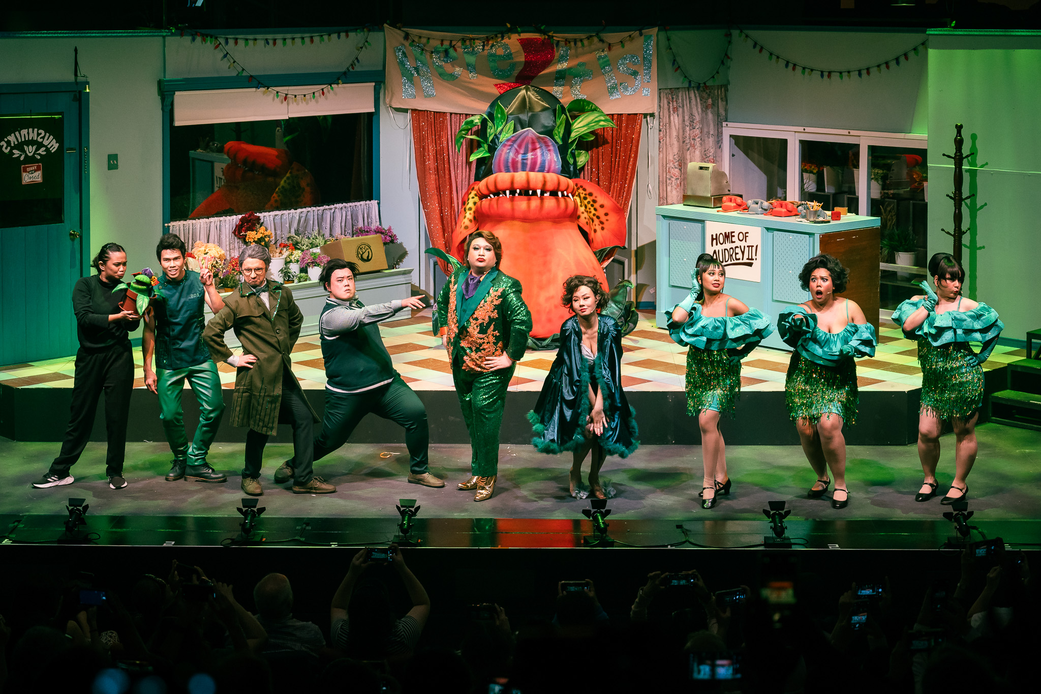 Wide shot of the Little Shop of Horrors cast