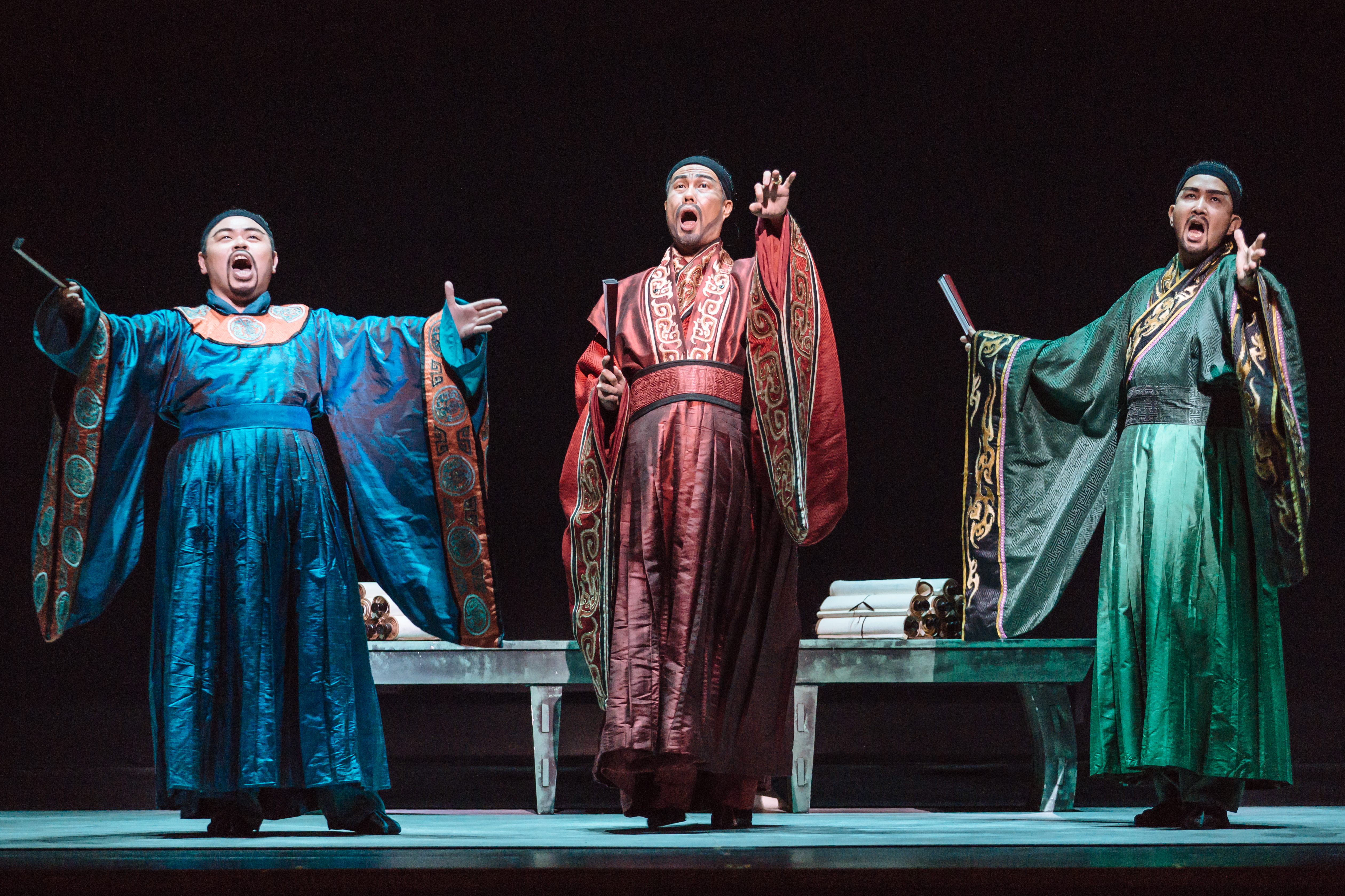 Wide shot of performers acting on stage