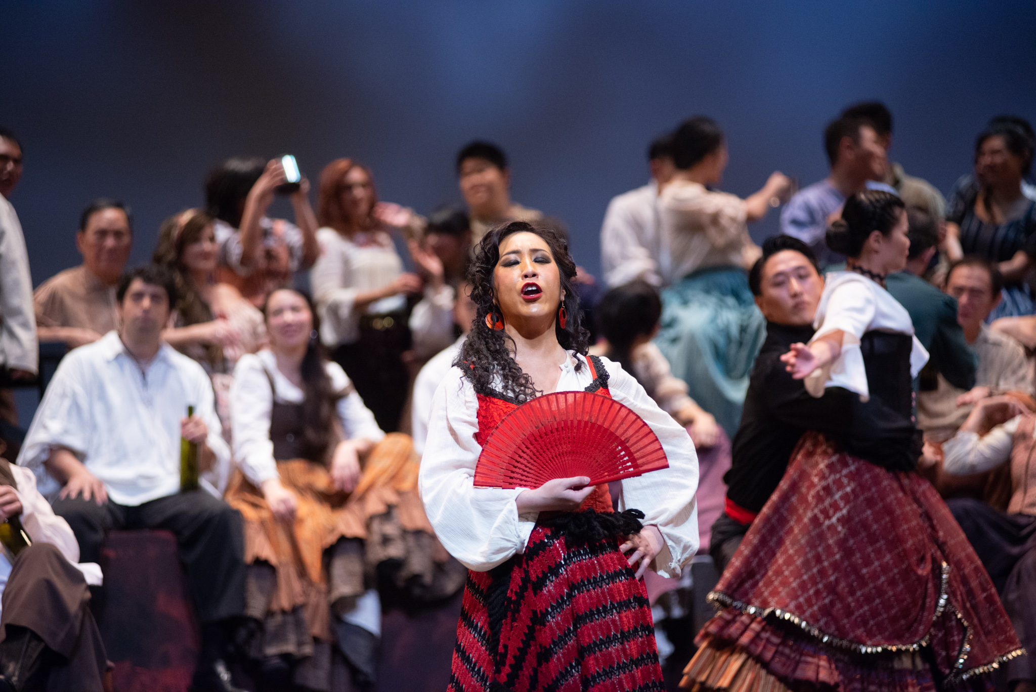Mid shot of a passionate opera singer performing live