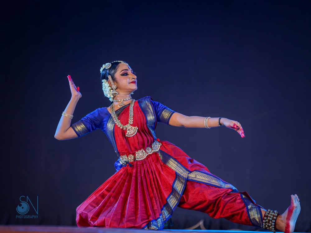 Close up of Indian dancer Shantha Ratii in mid-performance 