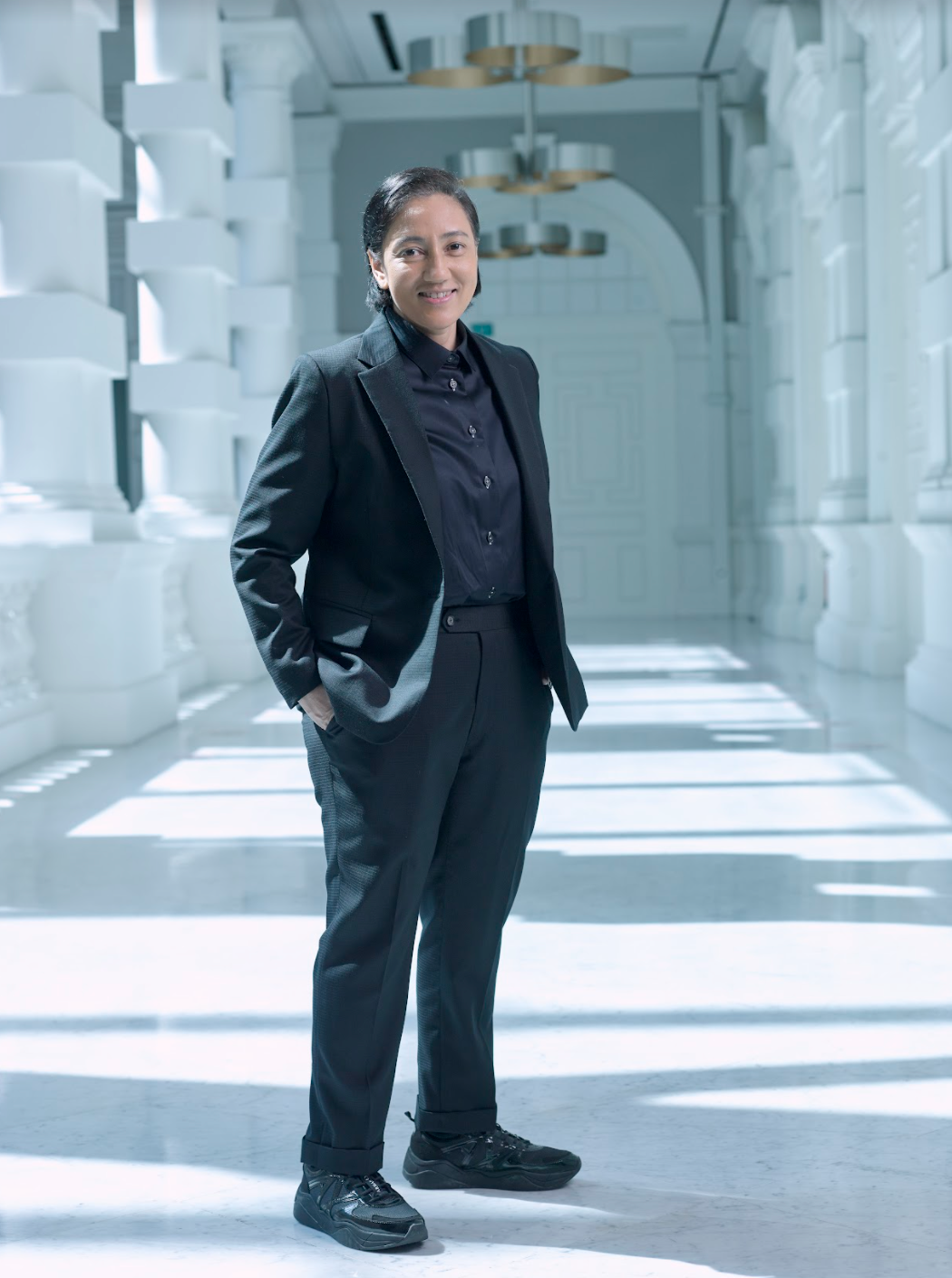 Full body shot of Natalie Hennedige, the Festival Director of Singapore International Festival of Arts 2023