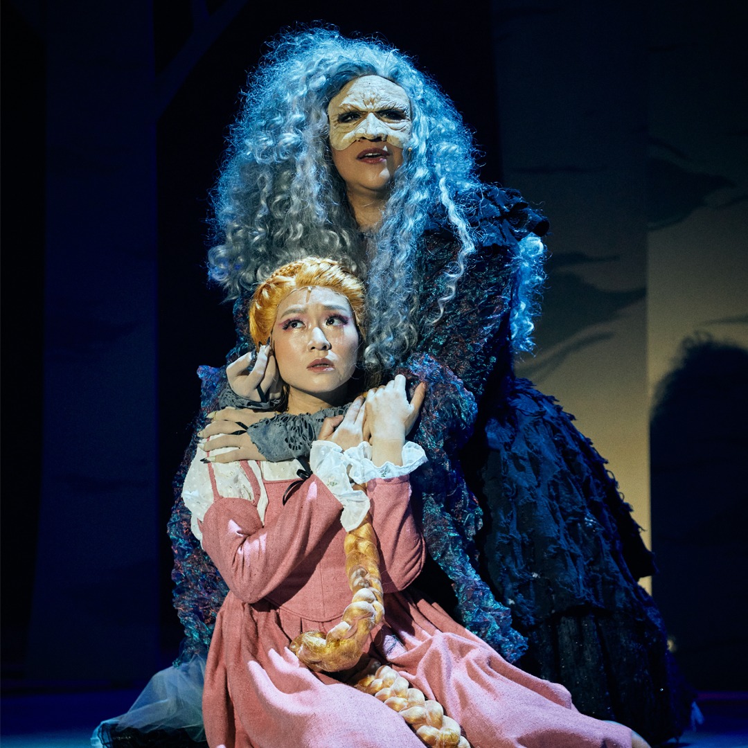 Mid shot of Mina Ellen Kaye and Inch Chua onstage in Into The Woods