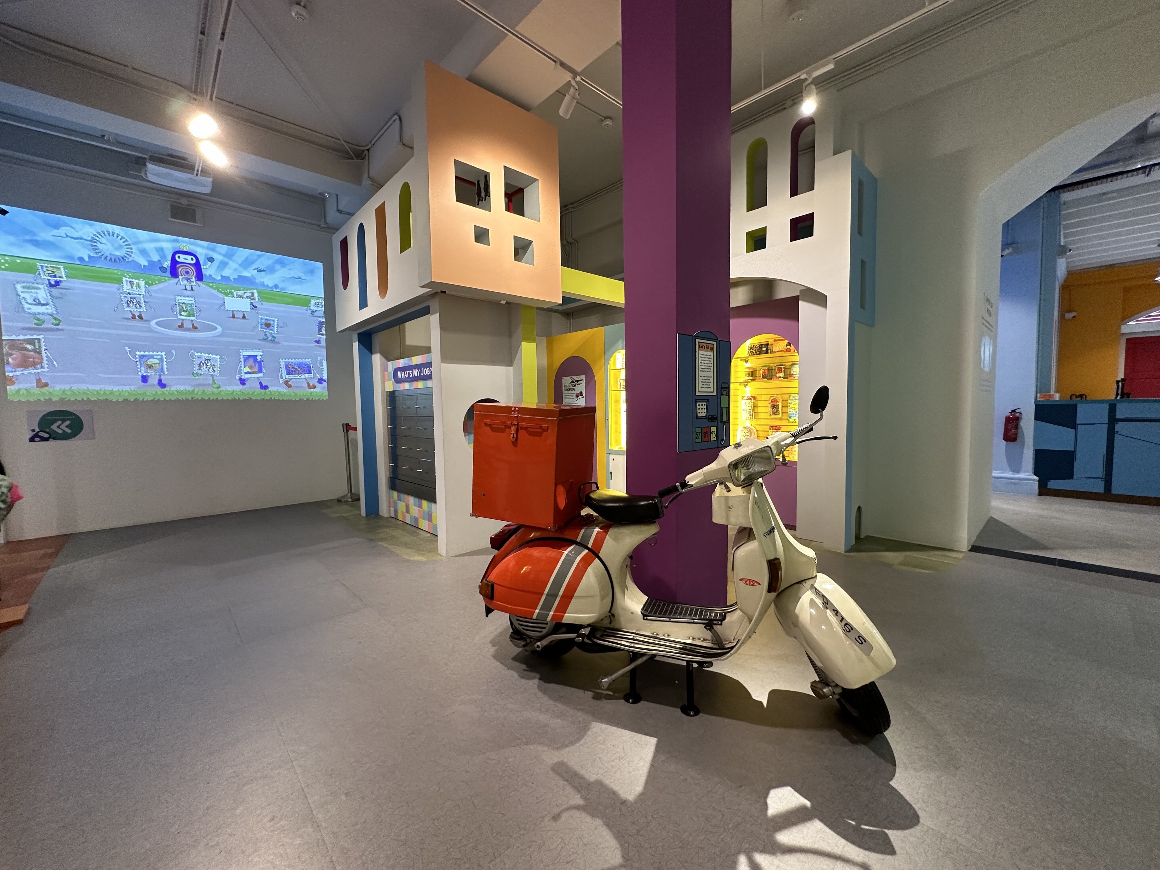   Wide shot of a scooter in the My Neighbourhood exhibition at the Children’s Museum Singapore