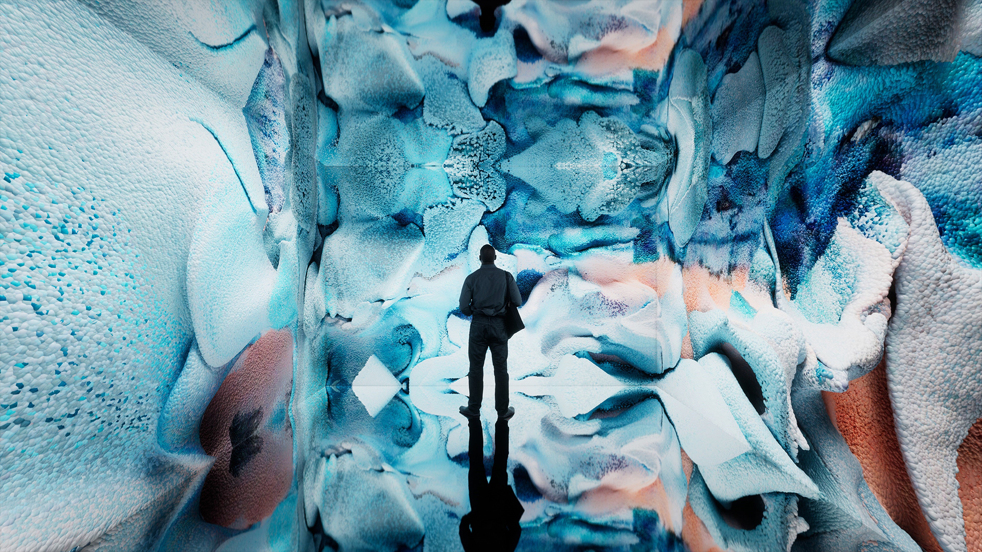 Wide shot of a man observing installation Glacier Dreams