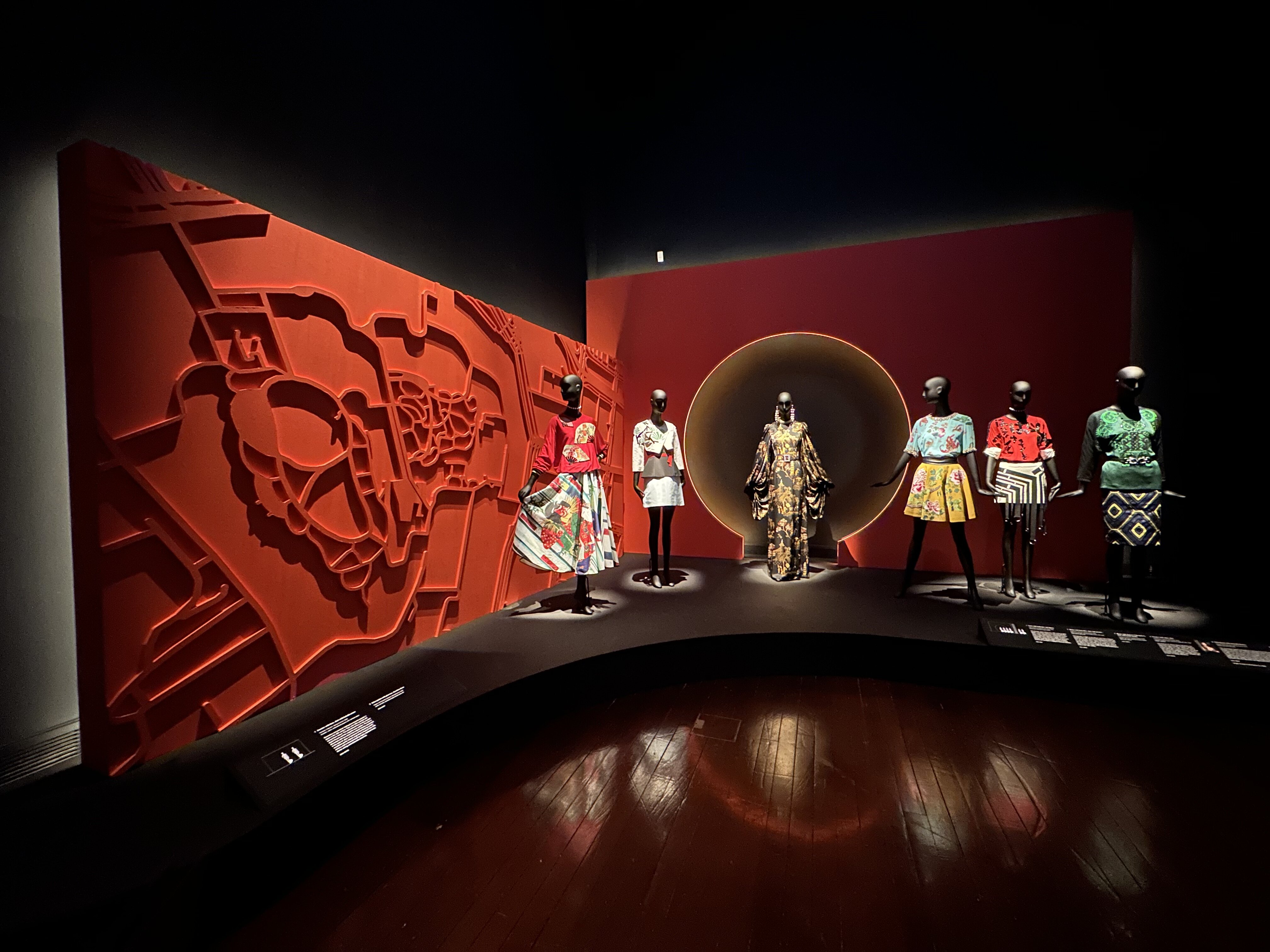 Wide shot of colourful designs by Andrew Gn on display