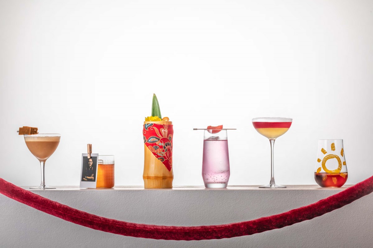Wide shot of a colourful set of cocktails