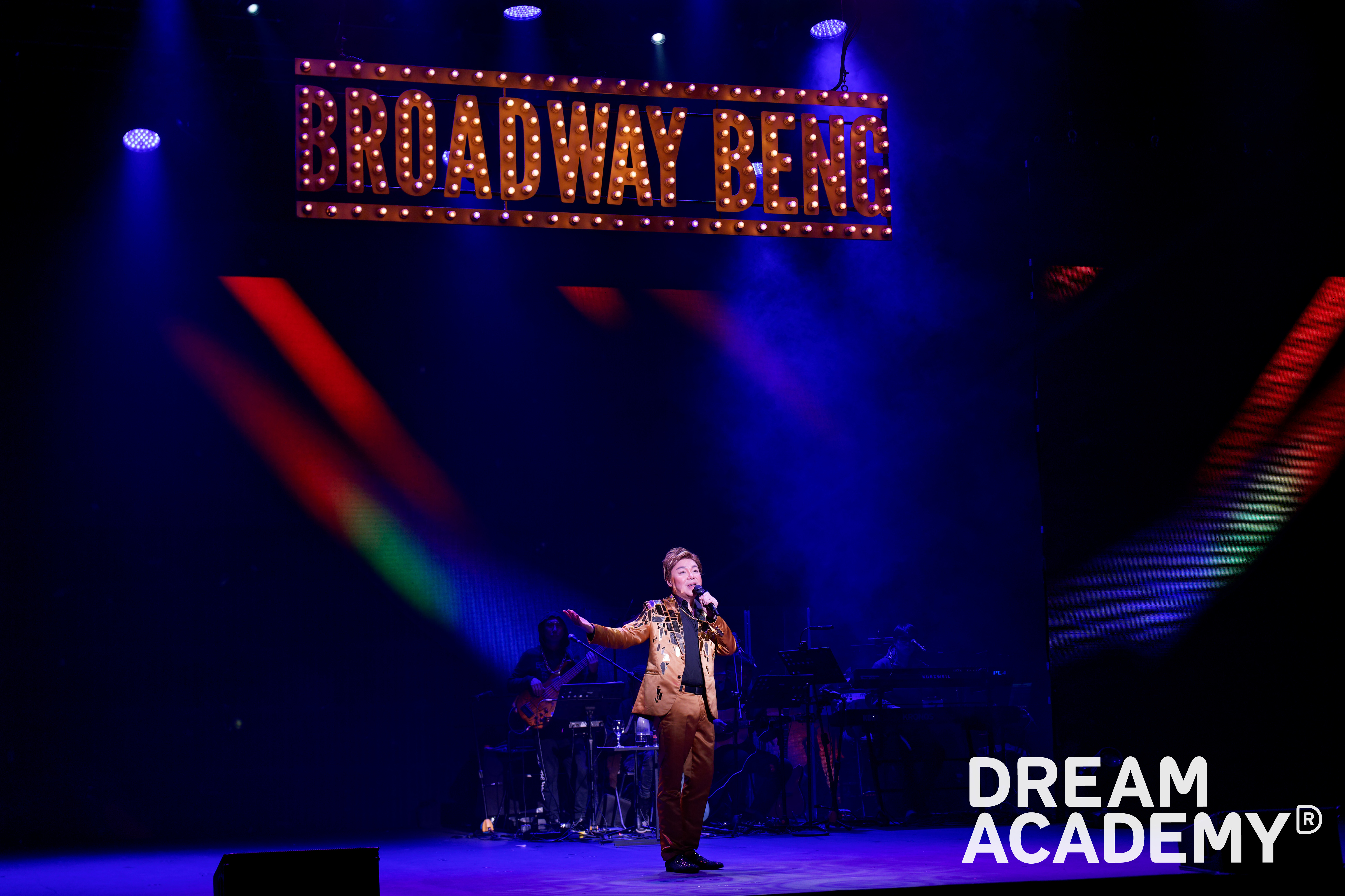 Wide shot of Broadway Beng performing onstage