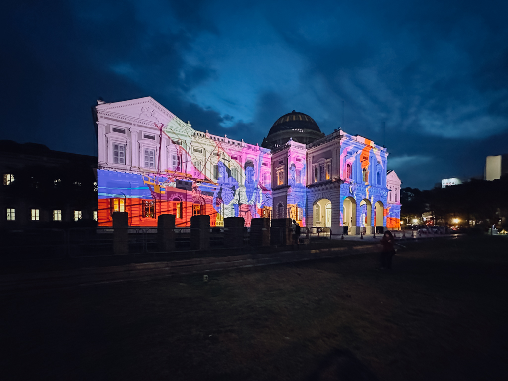 Wide shot of the 700 years projection mapping on the facade of National Museum of Singapore