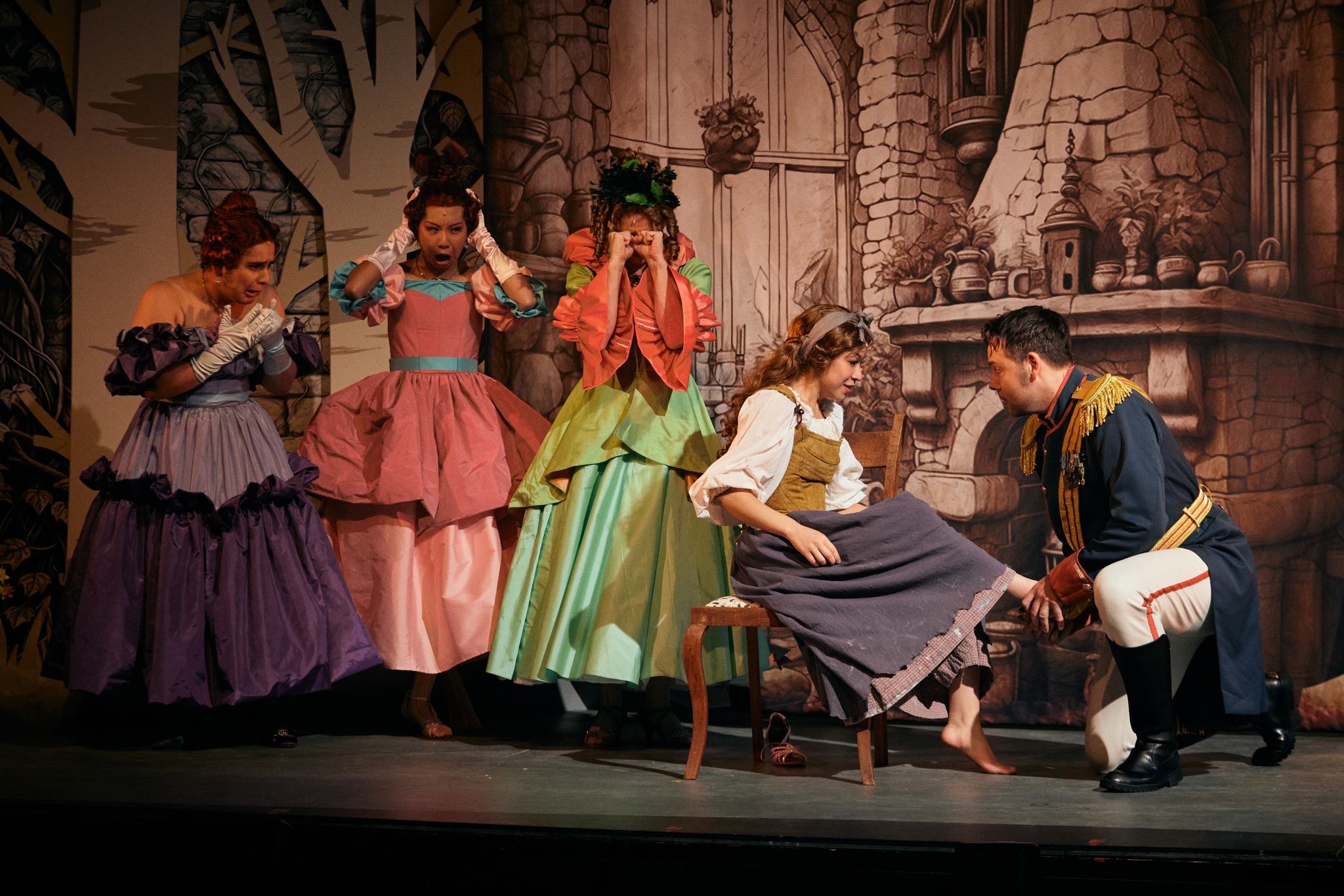 Wide shot of Sharon Mah, Chloe Chua, Marissa Vojodi, Nathania Ong, and Daniel Koek onstage in into The Woods