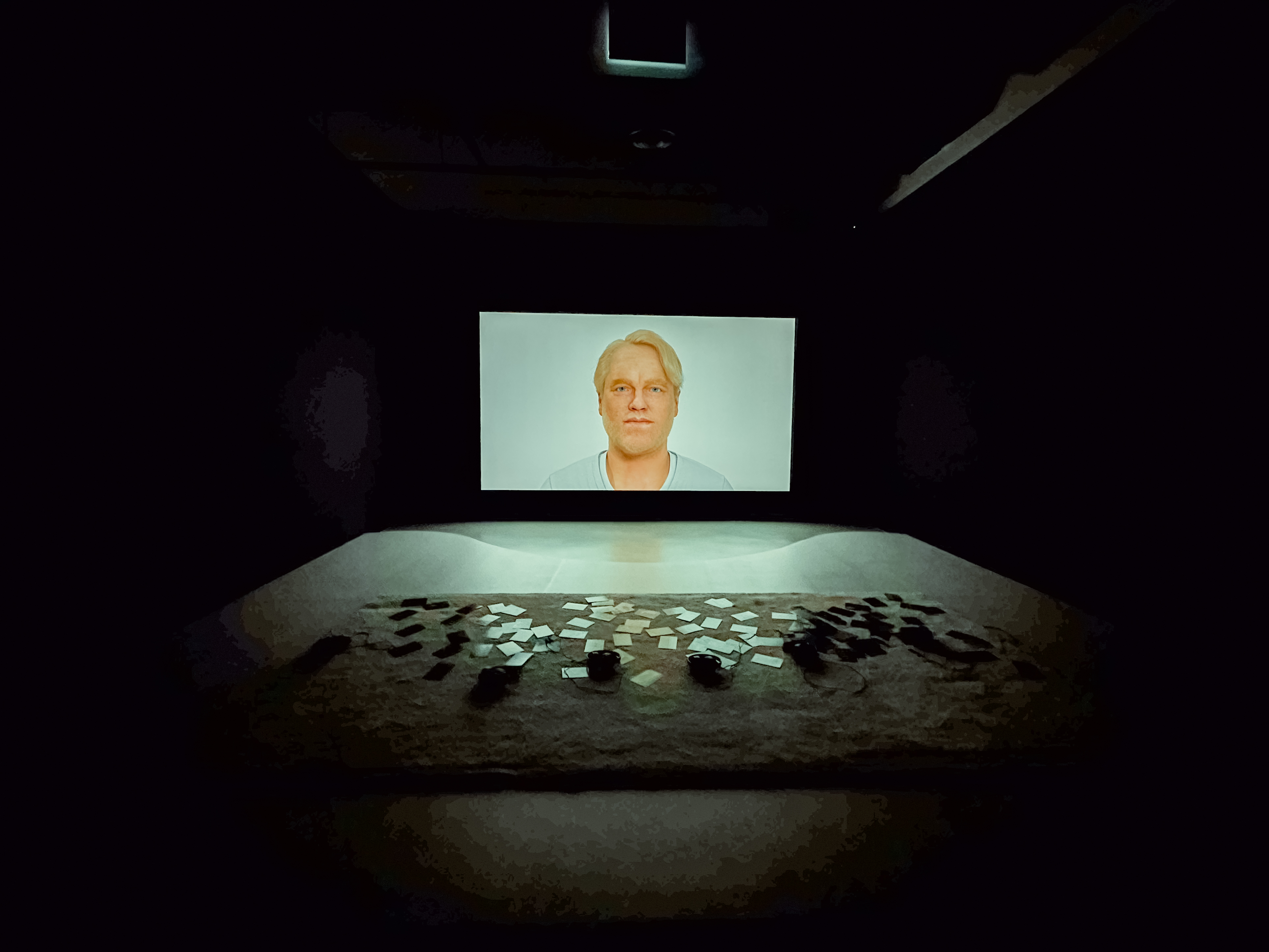 Wide shot of exhibition space, Hyperlinks or It Didn’t Happen by American-Belgian artist Cécile B. Evans at Proof of Personhood at the Singapore Art Museum. 