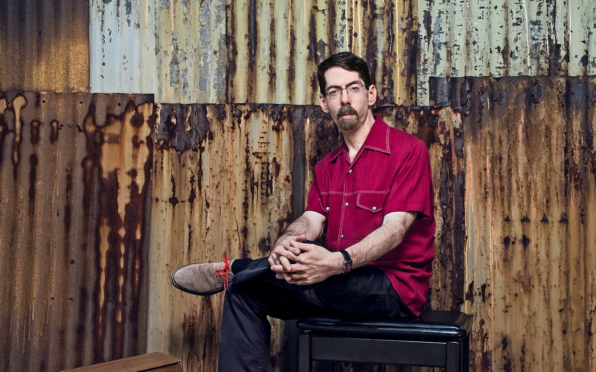  Mid shot of Fred Hersch posing for the camera