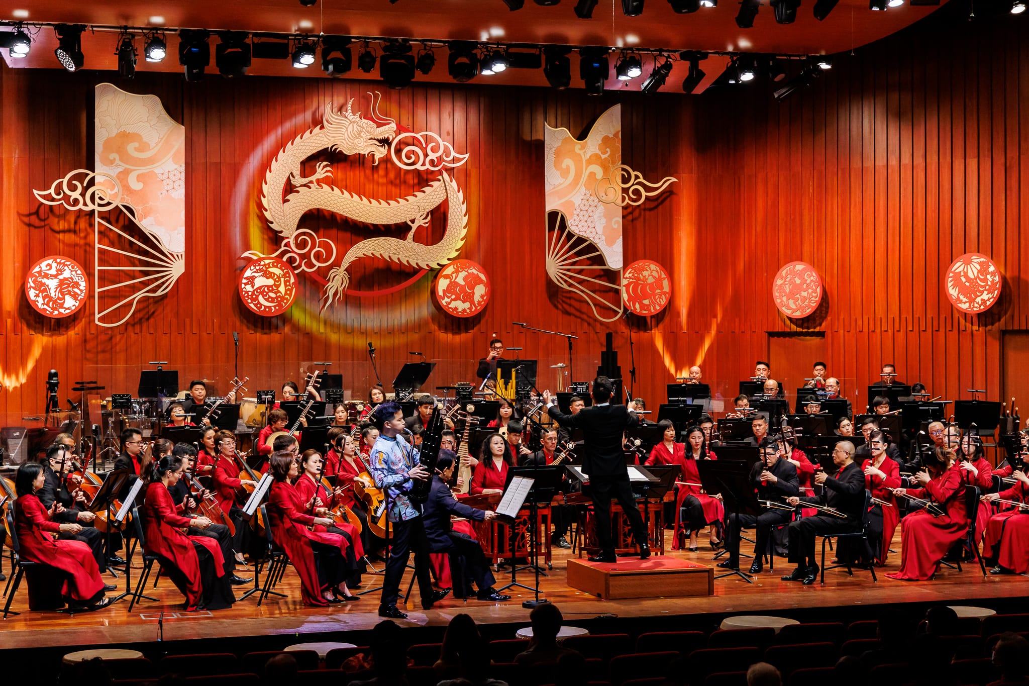 Wide shot of the Singapore Chinese Orchestra playing onstage