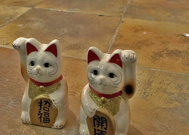 Close up of an exhibition piece from Lucky Cats
